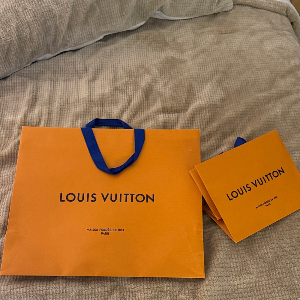 Louis Vuitton Bold Orange Bags with Blue Handles